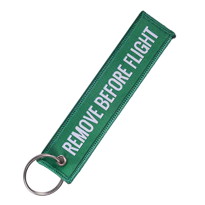Groene Remove Before Flight Sleutelhanger Tweetaktshop