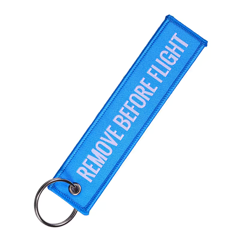 Blauwe Remove Before Flight Sleutelhanger Tweetaktshop